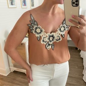 Burnt orange tank with cream and black embroidered flowers